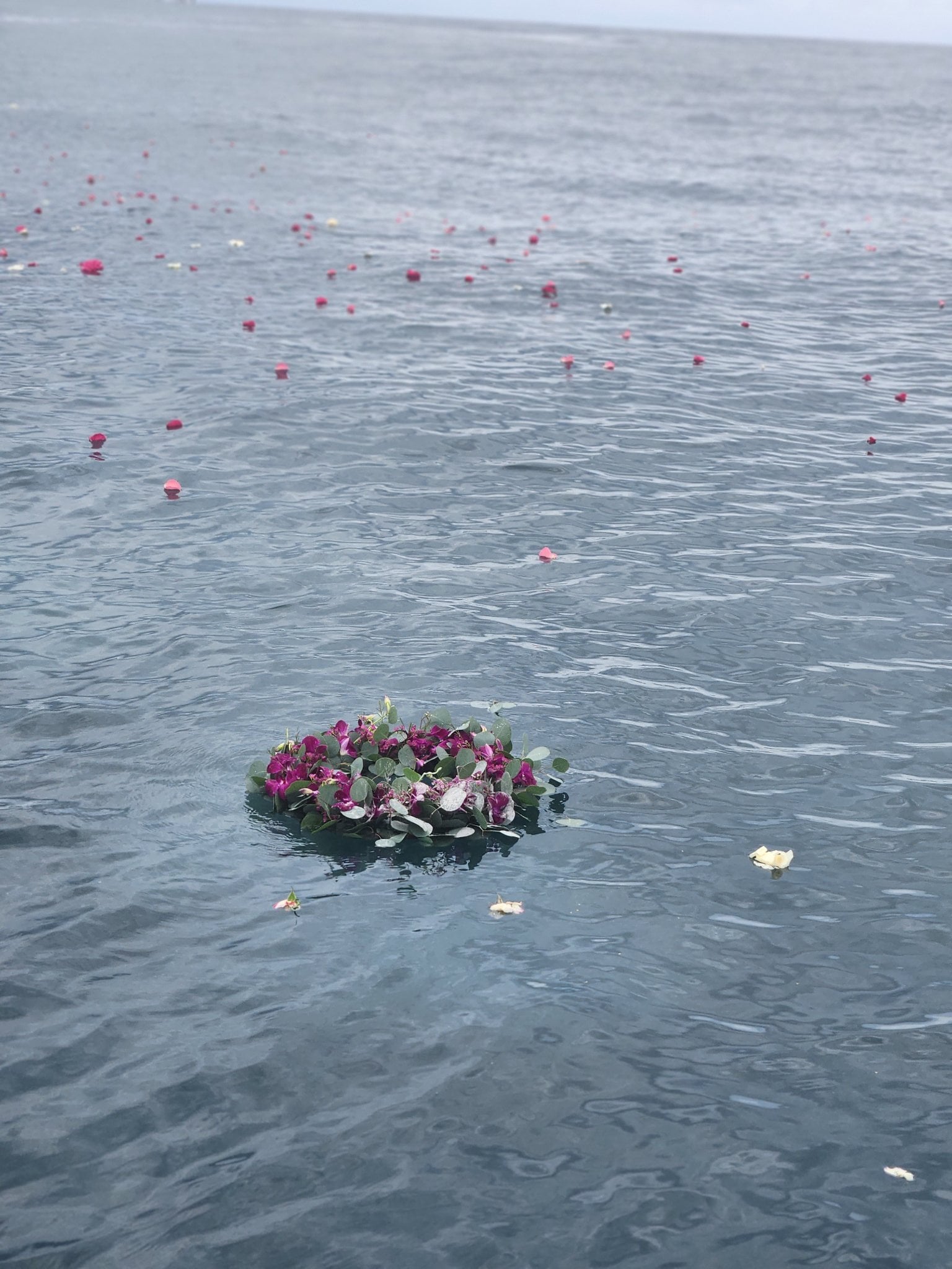 Calm ocean offshore New Smyrna Beach — non-attended burial at sea service